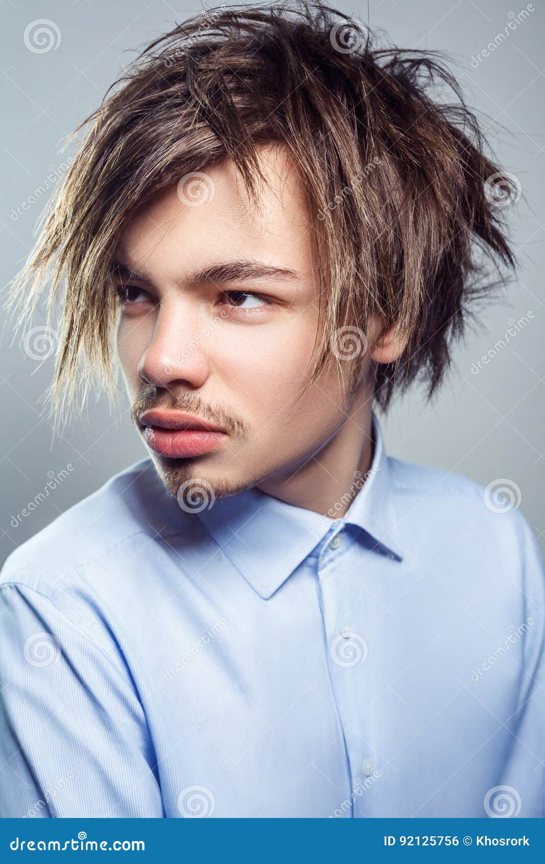 Portrait of Young Man with Fringe Messy Hairstyle. Studio Shot Stock Photo  - Image of beard, bangs: 92125756
