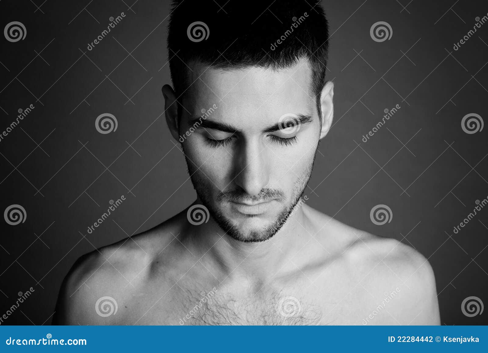 Portrait Of Young Man Looking Down Stock Photography - Image: 22284442