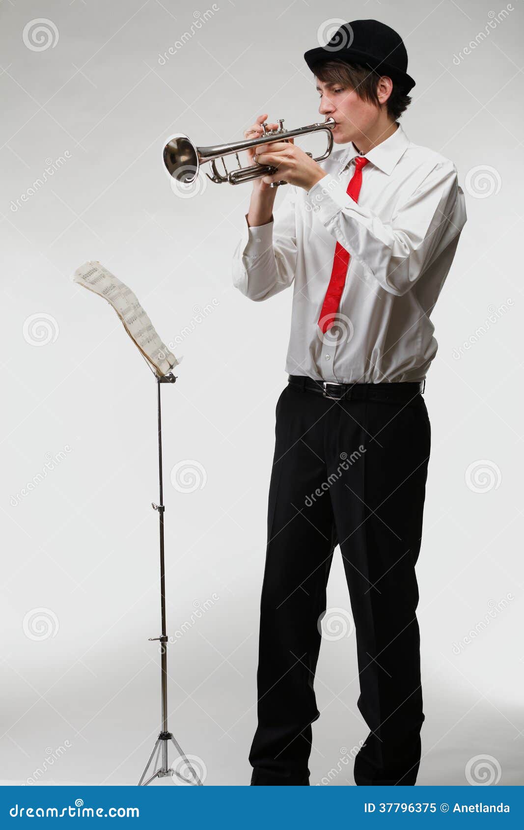 Portrait Of A Young Man Playing His Trumpet Royalty Free Stock Photo