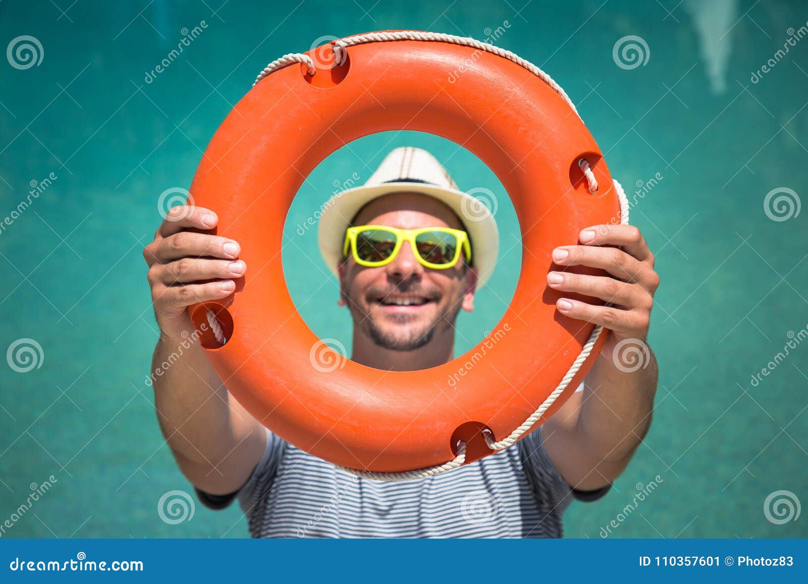 Tourist Guy Holding Lifebuoy Against Blue Swimming Pool Water Surface ...