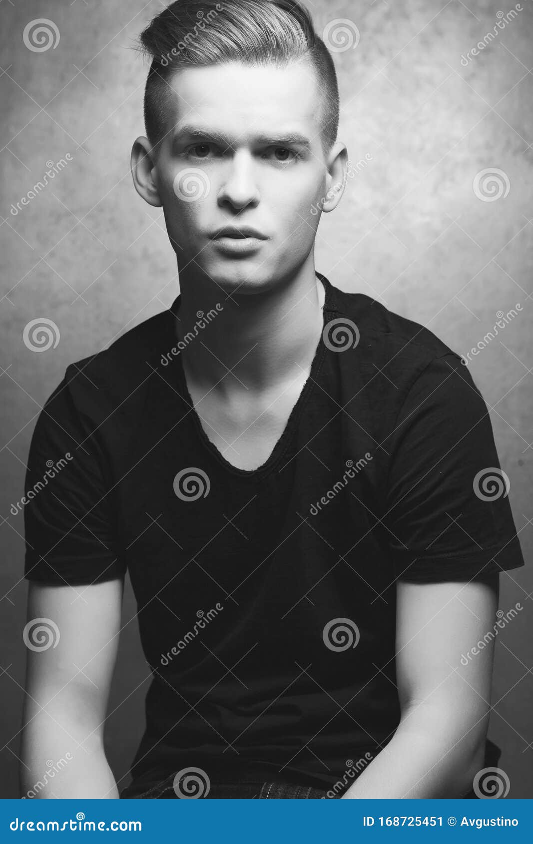 Portrait of a Young Man with Very Handsome Face in Black Casual T-shirt and Stylish Haircut Posing Over Silver Metal Background. Stock Image - Image of fresh, beauty: 168725451 Portrait of a Young Man with Very Handsome Face in Black Casual T-shirt and Stylish Haircut Posing Over Silver Metal Background. Stock Image - Image of fresh, beauty: 168725451