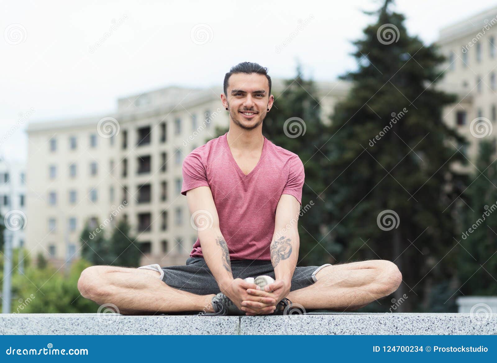 Calm african american woman doing yoga exercise, sitting in baddha  konasana, bound angle or butterfly pose Stock Photo | Adobe Stock