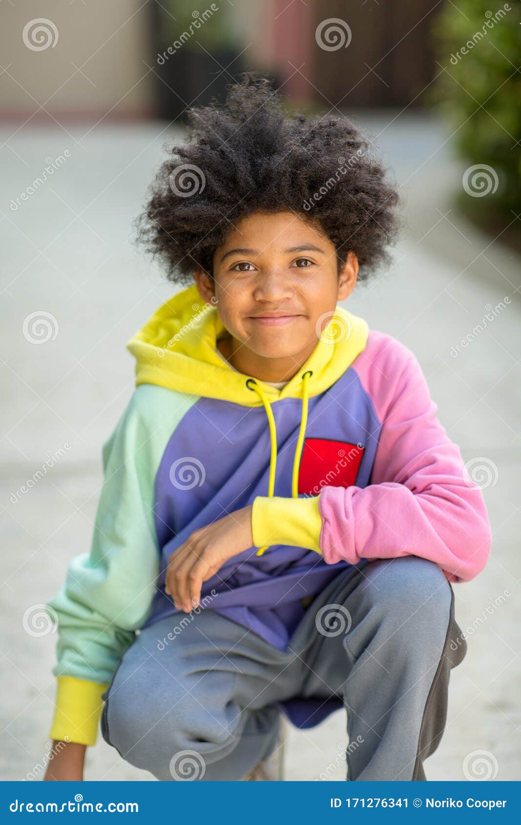 Young Mixed Race Teenage Boy Looking At The Camera Stoc