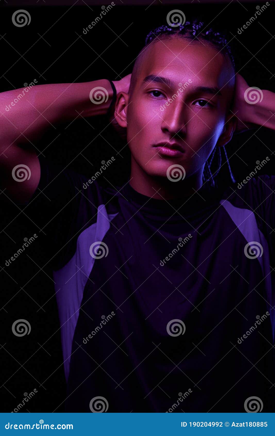 Portrait Of A Young Naked African Man At Studio. High Fashion Male Model In Colorful Neon Bright 