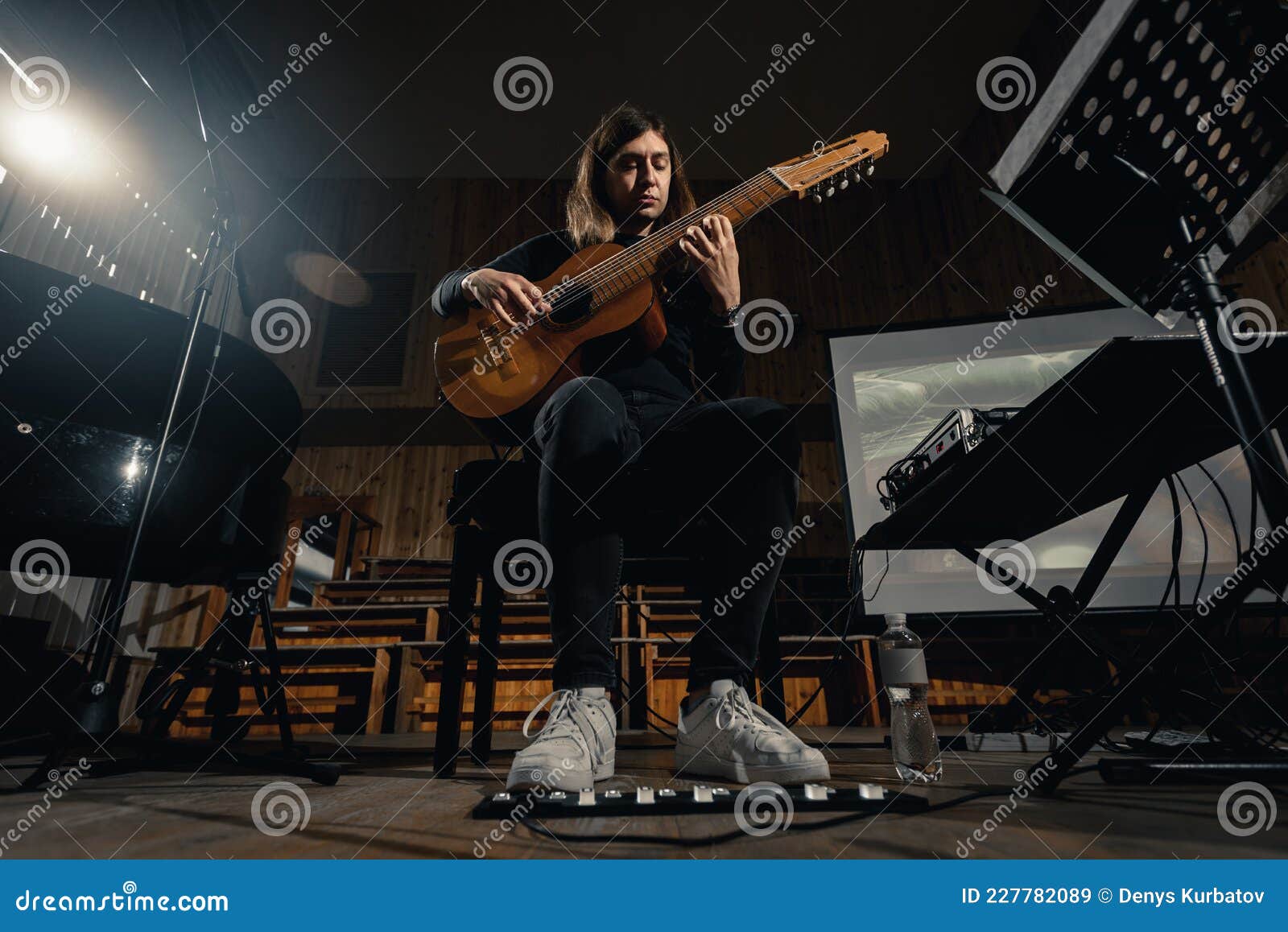 male guitarist on stage