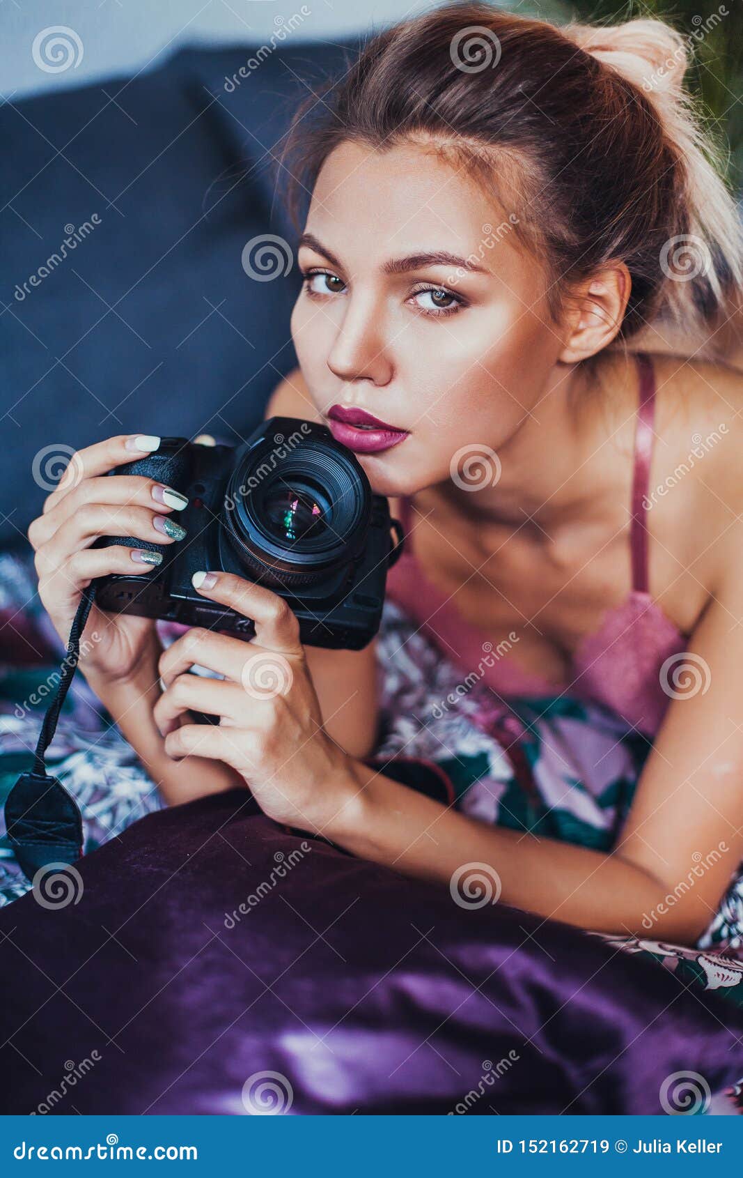 Portrait of Young Sensual Woman with Camera. Stock Image - Image of