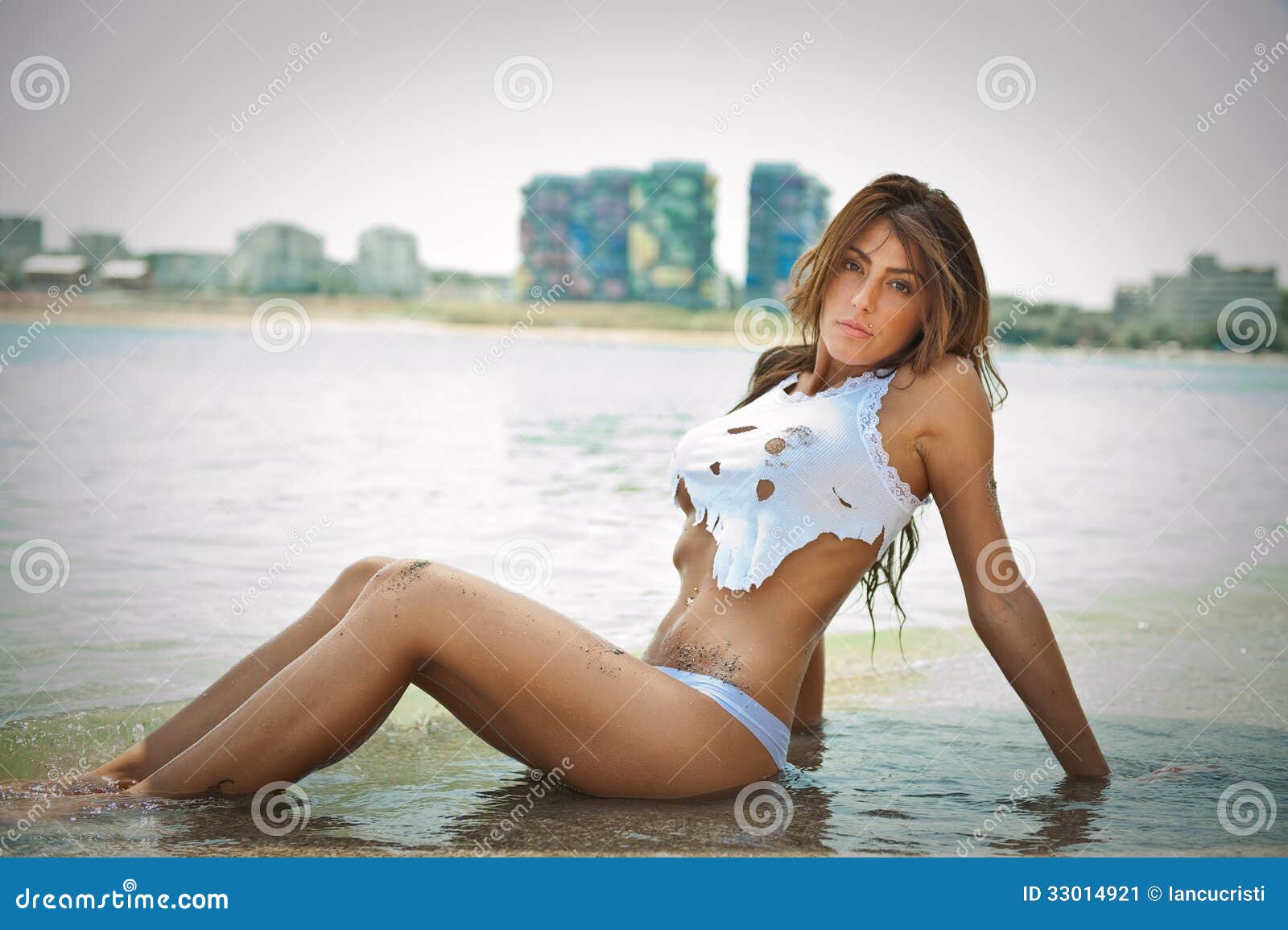 1600px x 1155px - Portrait of Young Brunette Girl in White Bikini and Wet T-shirt at the Beach  Stock Image - Image of bikini, long: 33014921