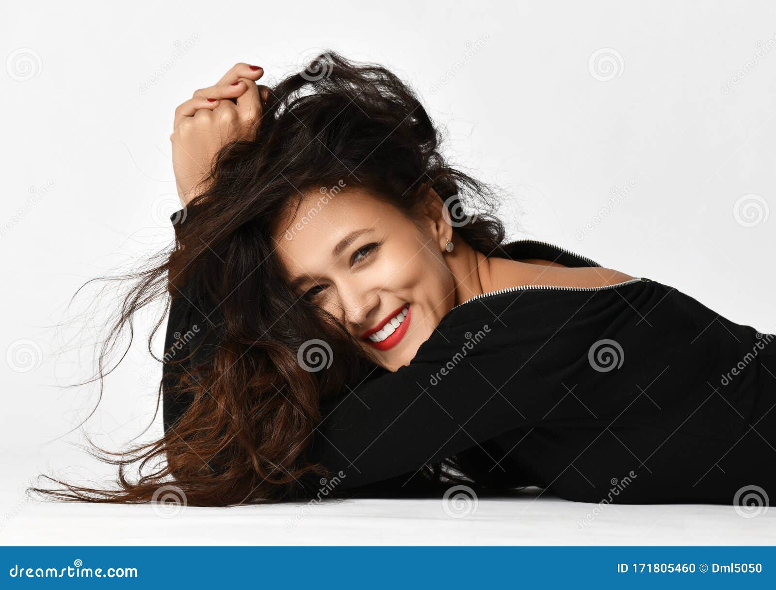 curly brunette posing black