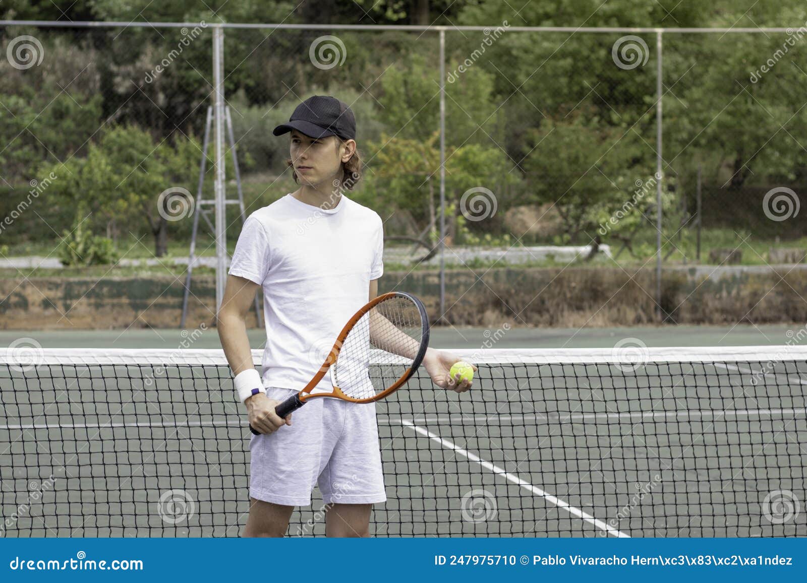 I Was Waiting To Play Tennis Yesterday When My Partner Portrait of Young Sporty Boy with Cap Holding His Tennis Equipment and