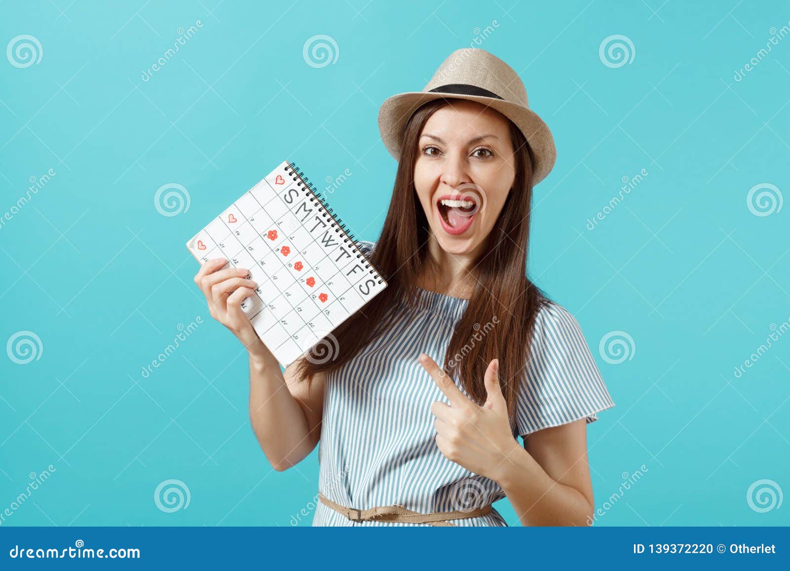 Portrait Of Young Woman In Blue Dress Hat Holding Female Periods