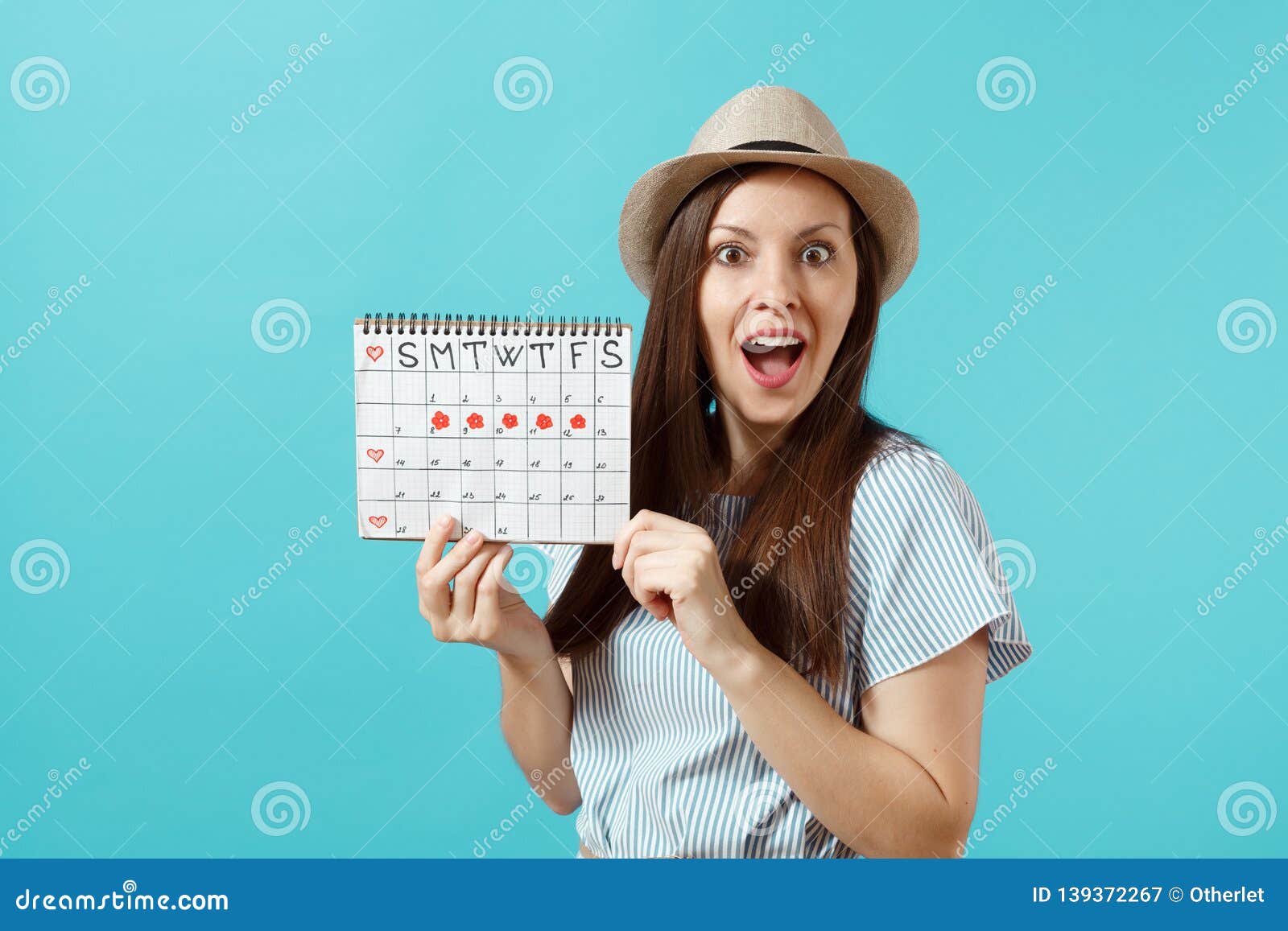 Portrait Of Young Woman In Blue Dress Hat Holding Female Periods