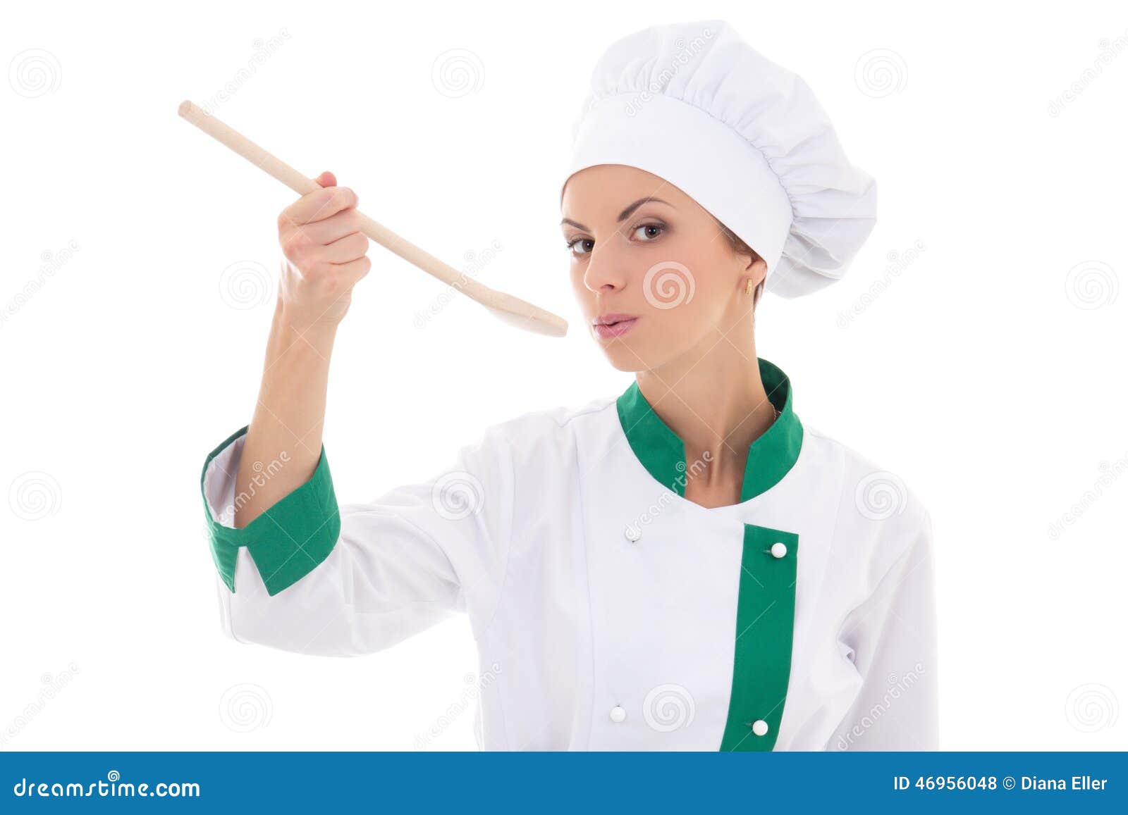 Portrait of Young Woman in Chef Uniform Tasting Something Isolated on ...