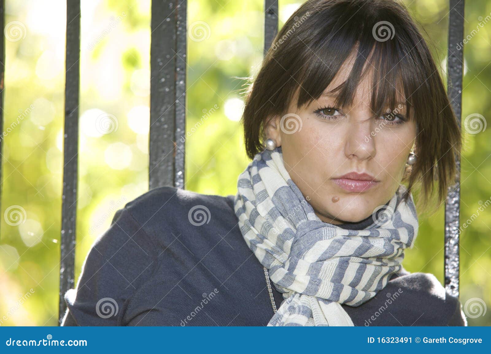 Portrait of Young Woman at Gate Stock Image Image of hair, trendy