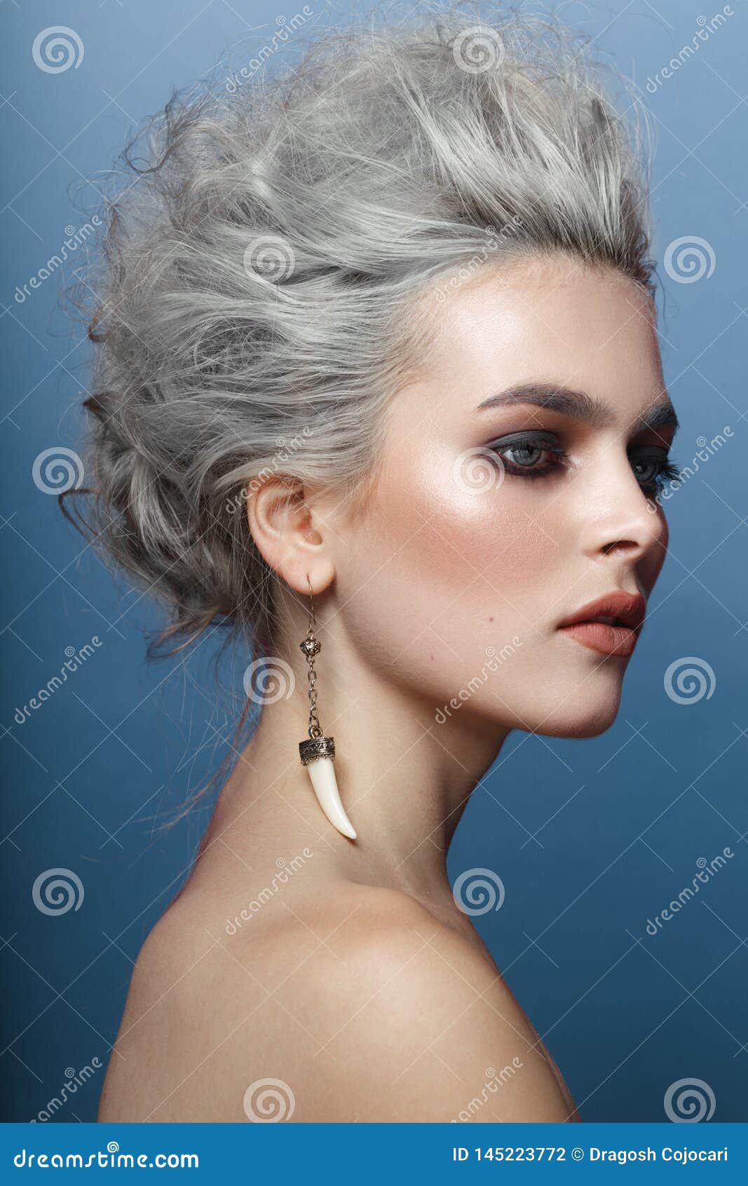 Portrait of Young Woman with Gray Hairstyle, Smokey Eyes and Makeup with  Naked Shoulders, Isolated on Blue Background Stock Photo - Image of  coloring, beauty: 145223772