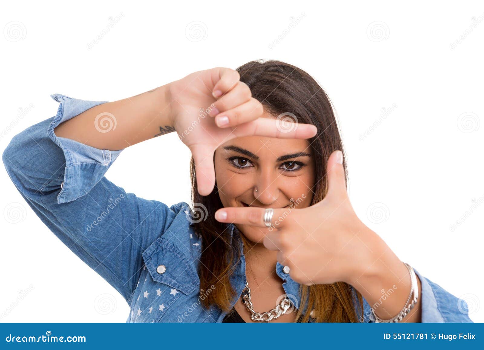 Portrait. Young woman making framing key gesture - isolated over white