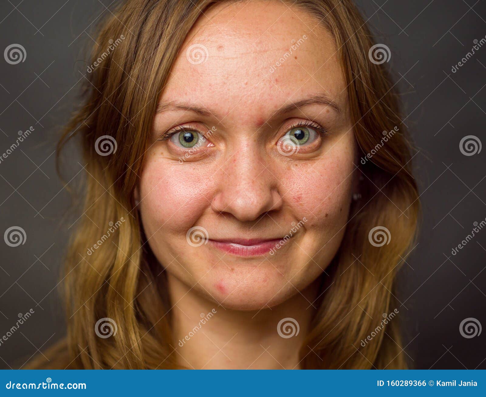 portrait of young woman, no make up, brown dark hair, no retouch making expressions.