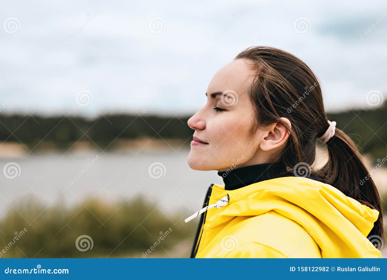 Portrait of a Young Woman in Profile in Nature Breathing Fresh, Clean ...