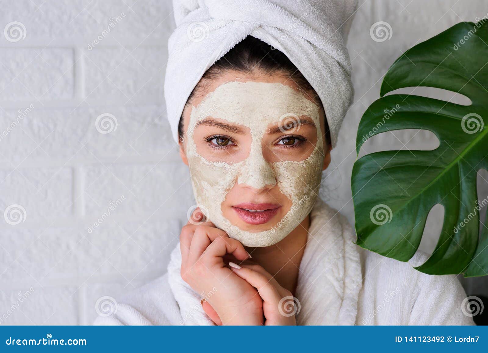 Young Woman in a Bathrobe and Towel on Her Head, Spa and Care Portrait ...