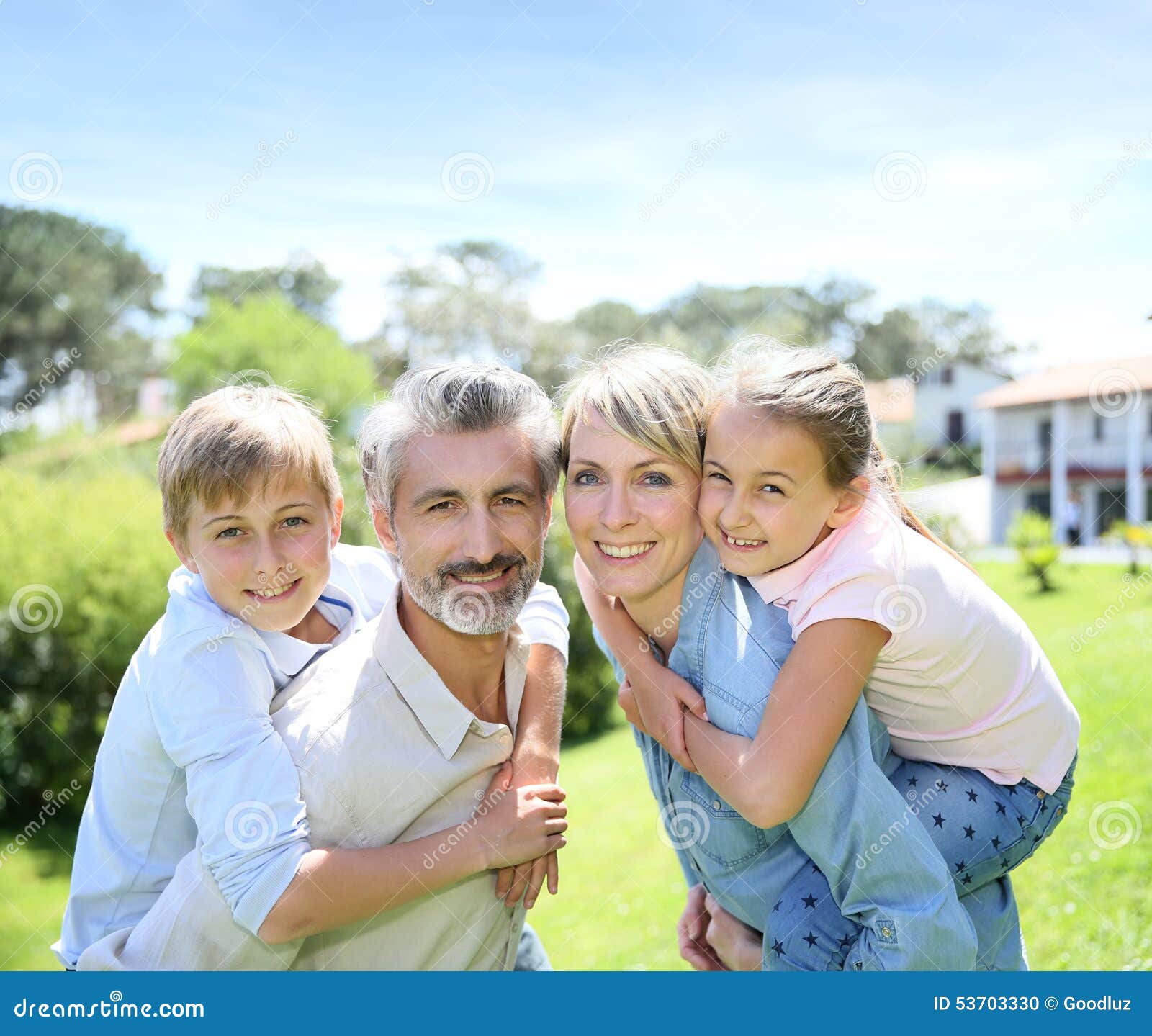 Portraot of Happy Family in the Garden Stock Photo - Image of caucasian