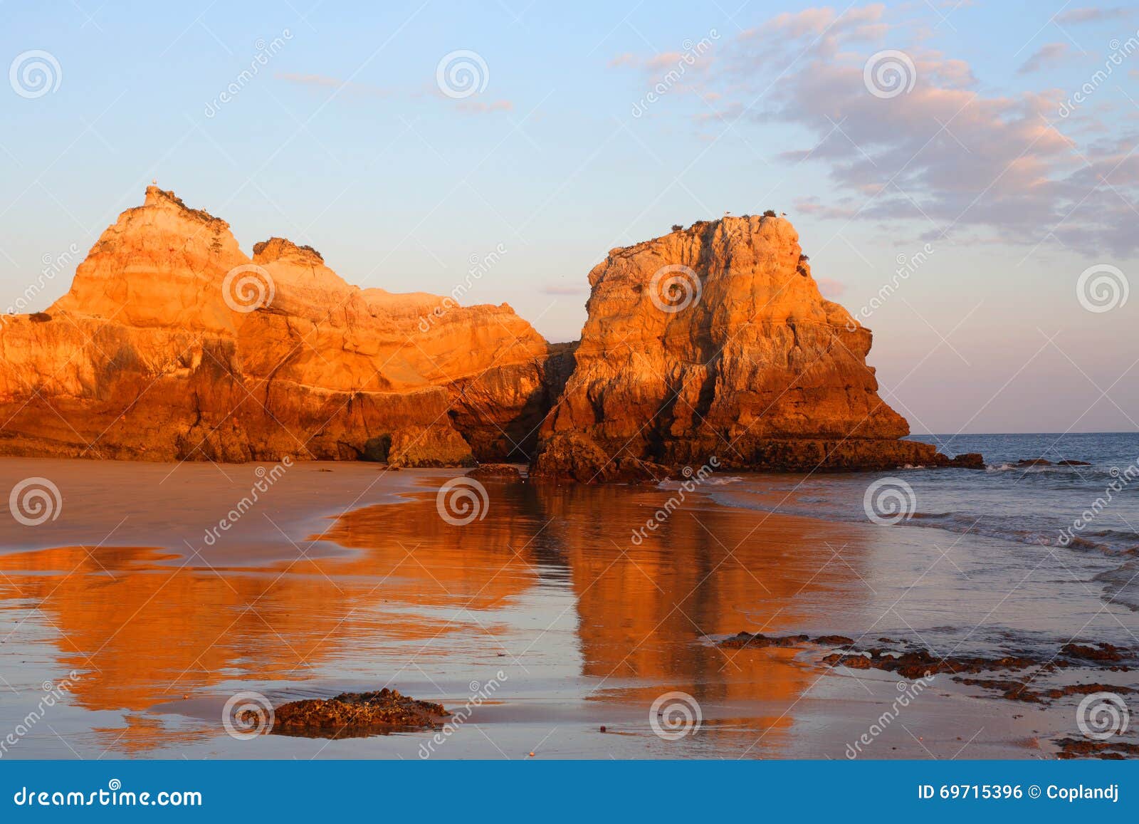 portugal, algarve, portimÃÂ£o, praia do vau. sandy beach and cliffs.