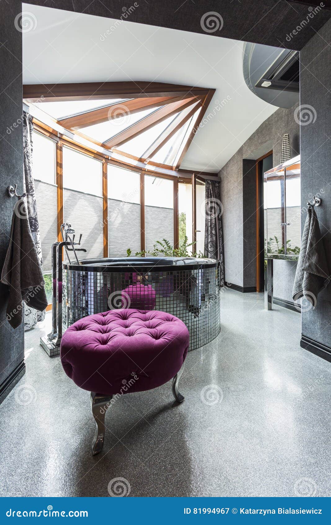 posh bathroom with window wall