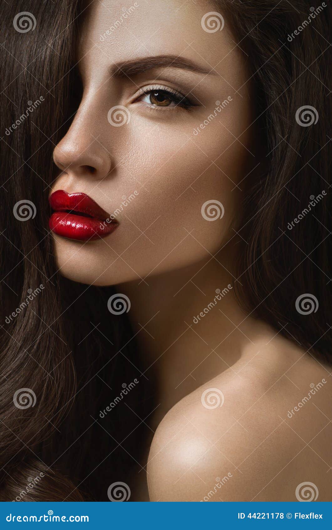 posh brunette woman with red lips