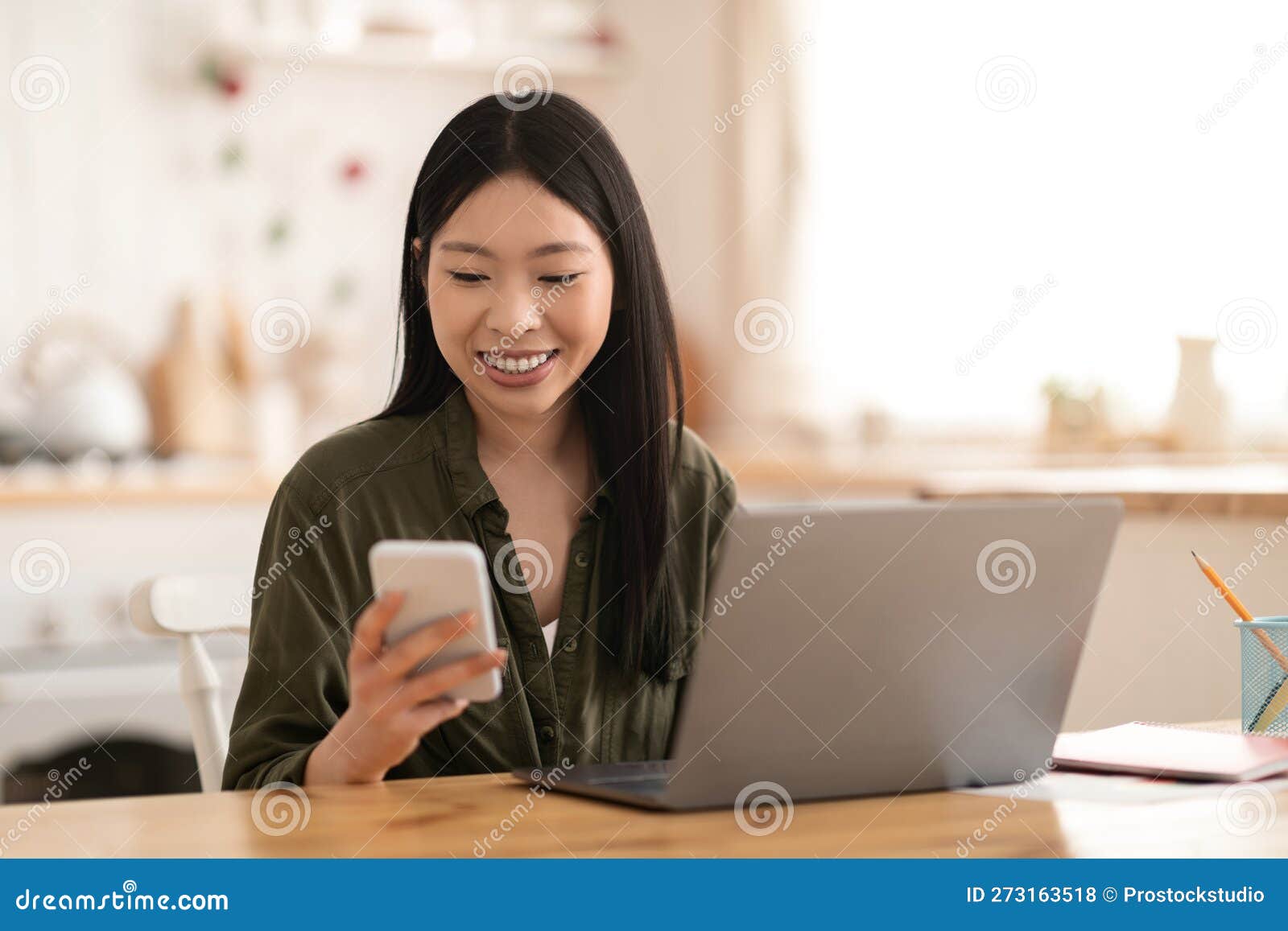 https://thumbs.dreamstime.com/z/positive-asian-woman-freelancer-working-home-using-gadgets-cheerful-pretty-young-female-independent-contractor-sitting-273163518.jpg