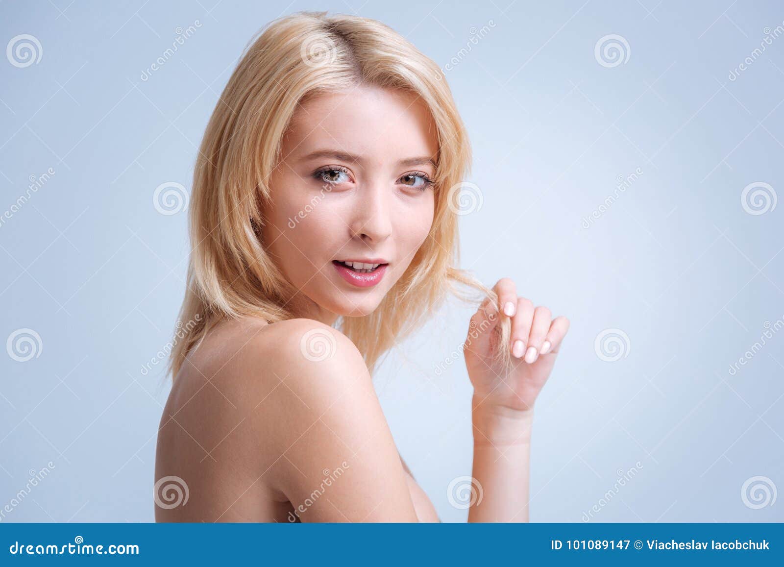 Positive Delighted Blonde Playing With Her Hair Stock Image Image Of Emotion Beauty 101089147