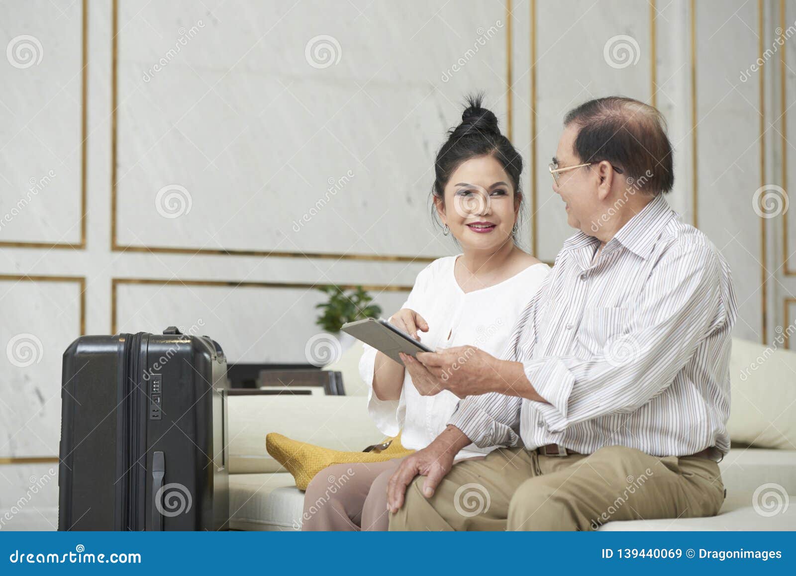 Senior Couple In Hotel Lobby Stock Image Image Of Hall Smiling