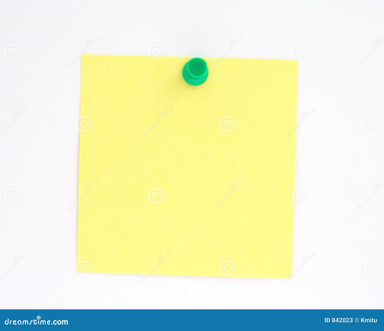 yellow note pinned to white paper wall