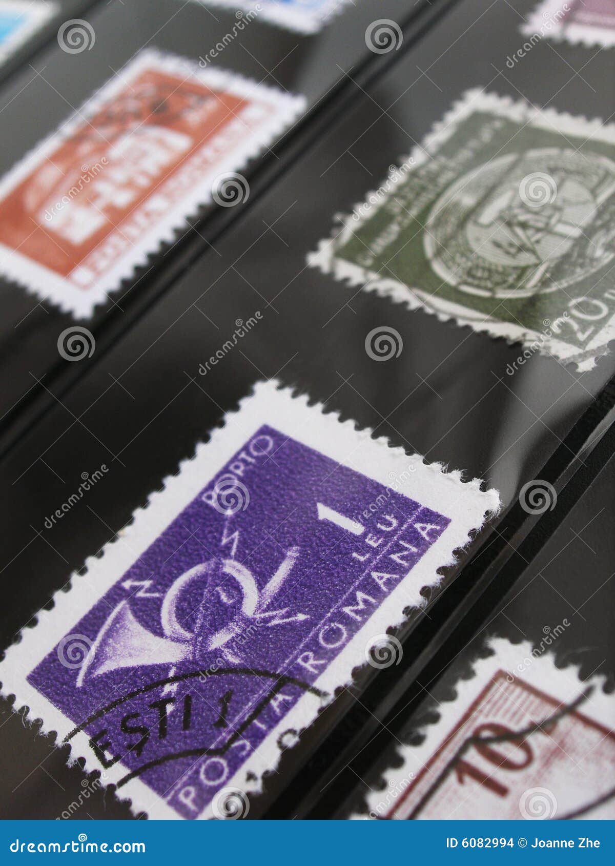 Postage stamps in album editorial stock image. Image of education 6082994