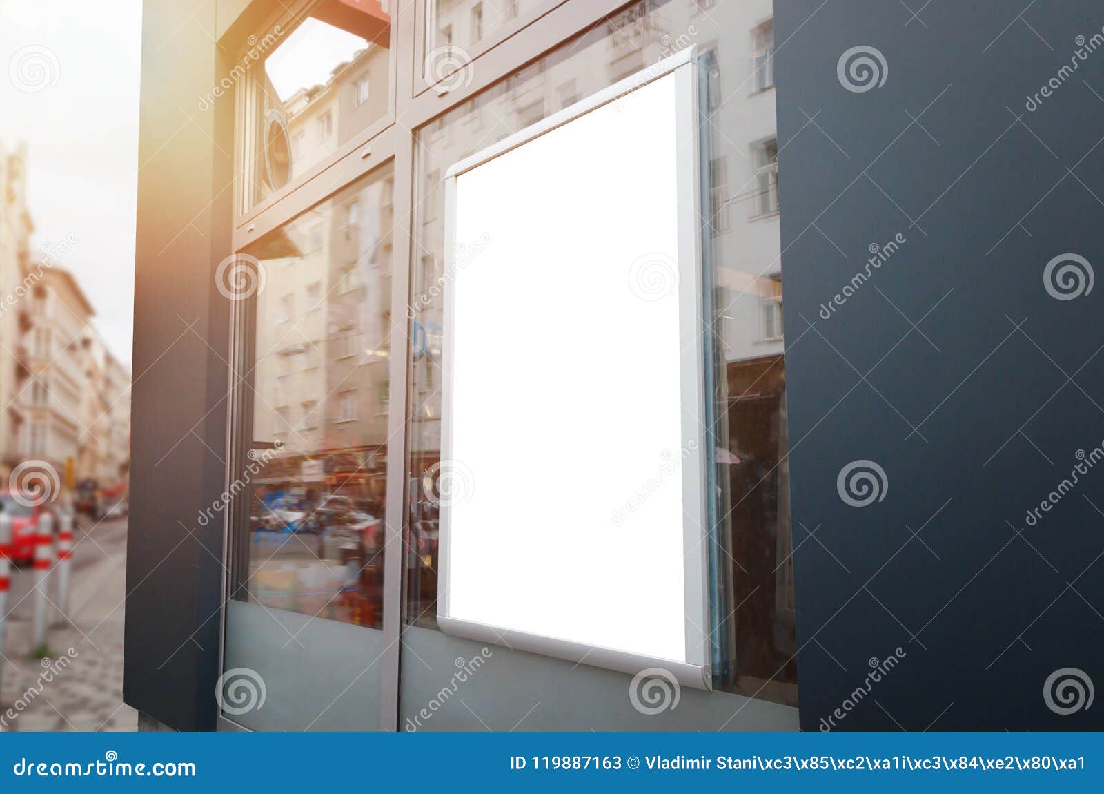 Download Poster Frame Mockup On The Window Of The Store In City ...