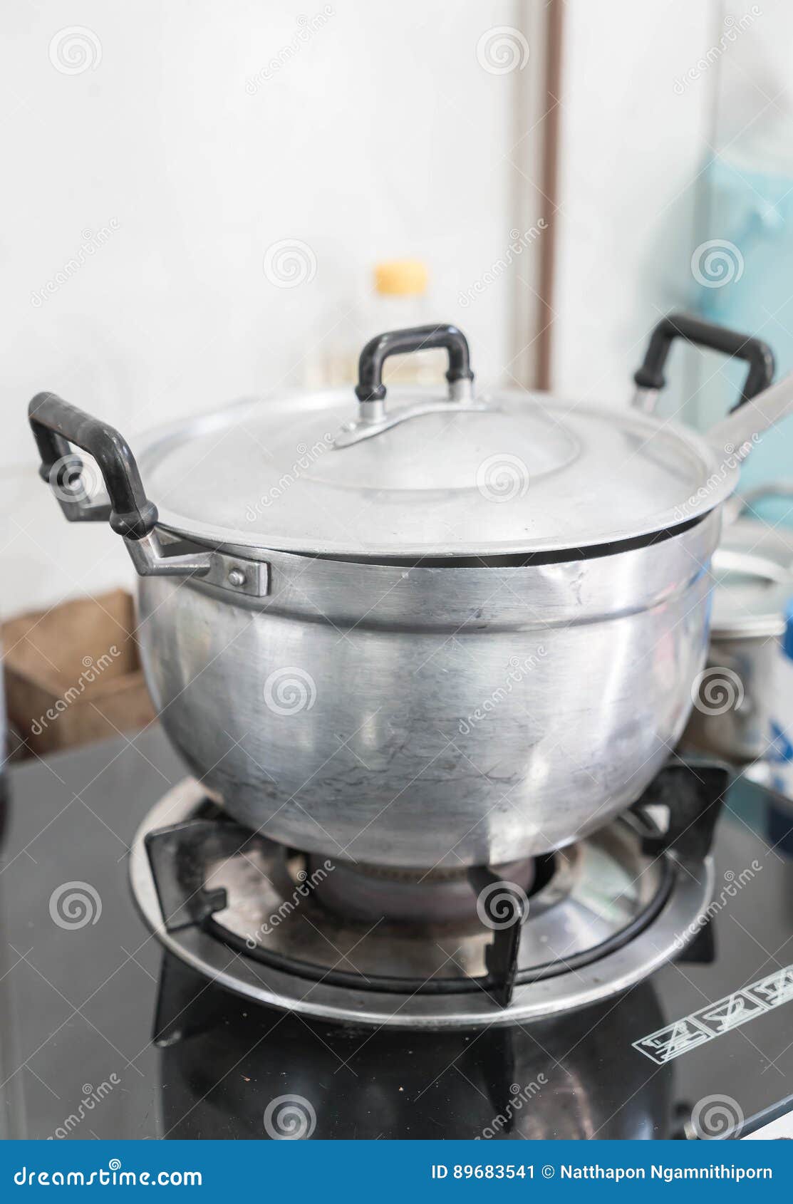 Pot on gas stove stock image. Image of white, skillet 89683541