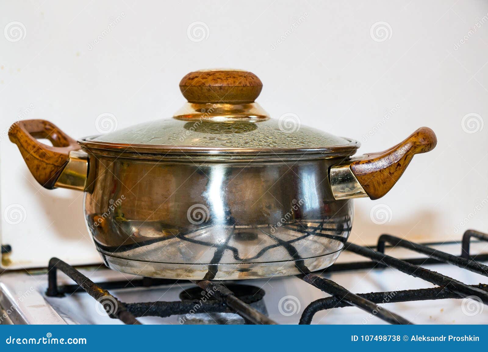 Pot on a gas stove stock photo. Image of object, glass 107498738
