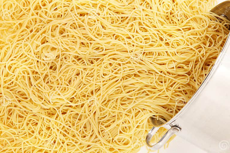 Pot of Spaghetti Noodles stock photo. Image of spilling 17553552