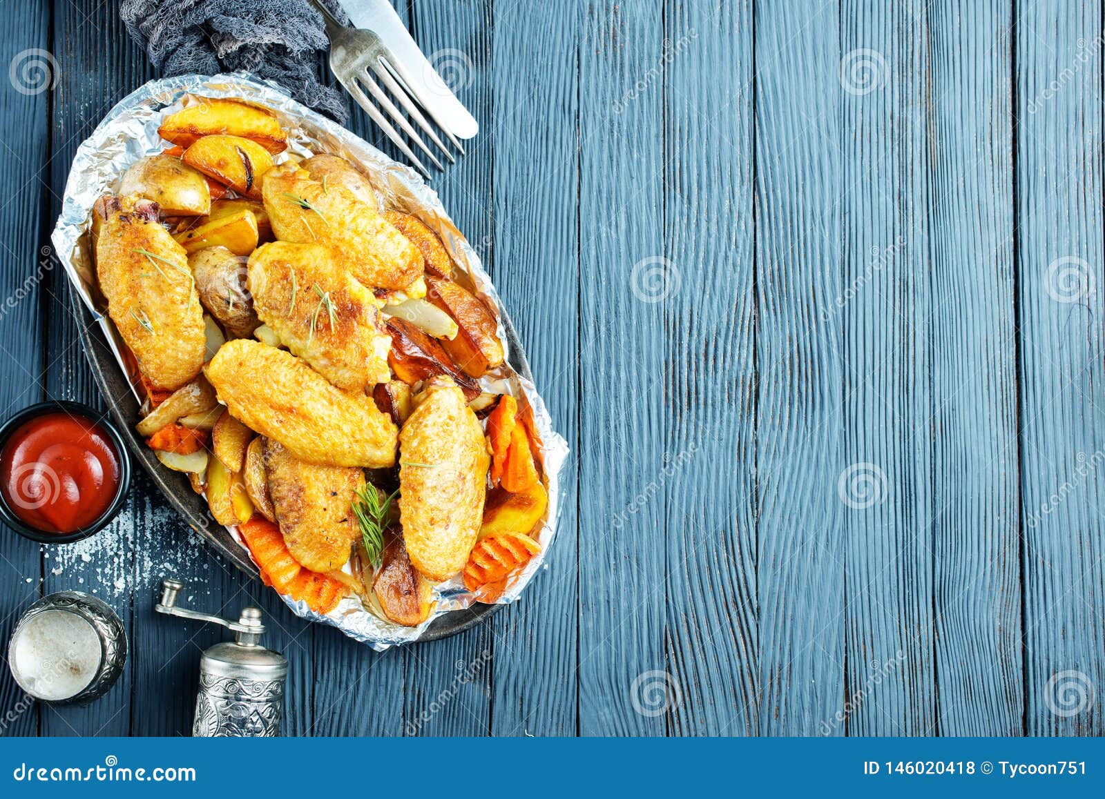 Potato with chicken wings stock photo. Image of meal 146020418