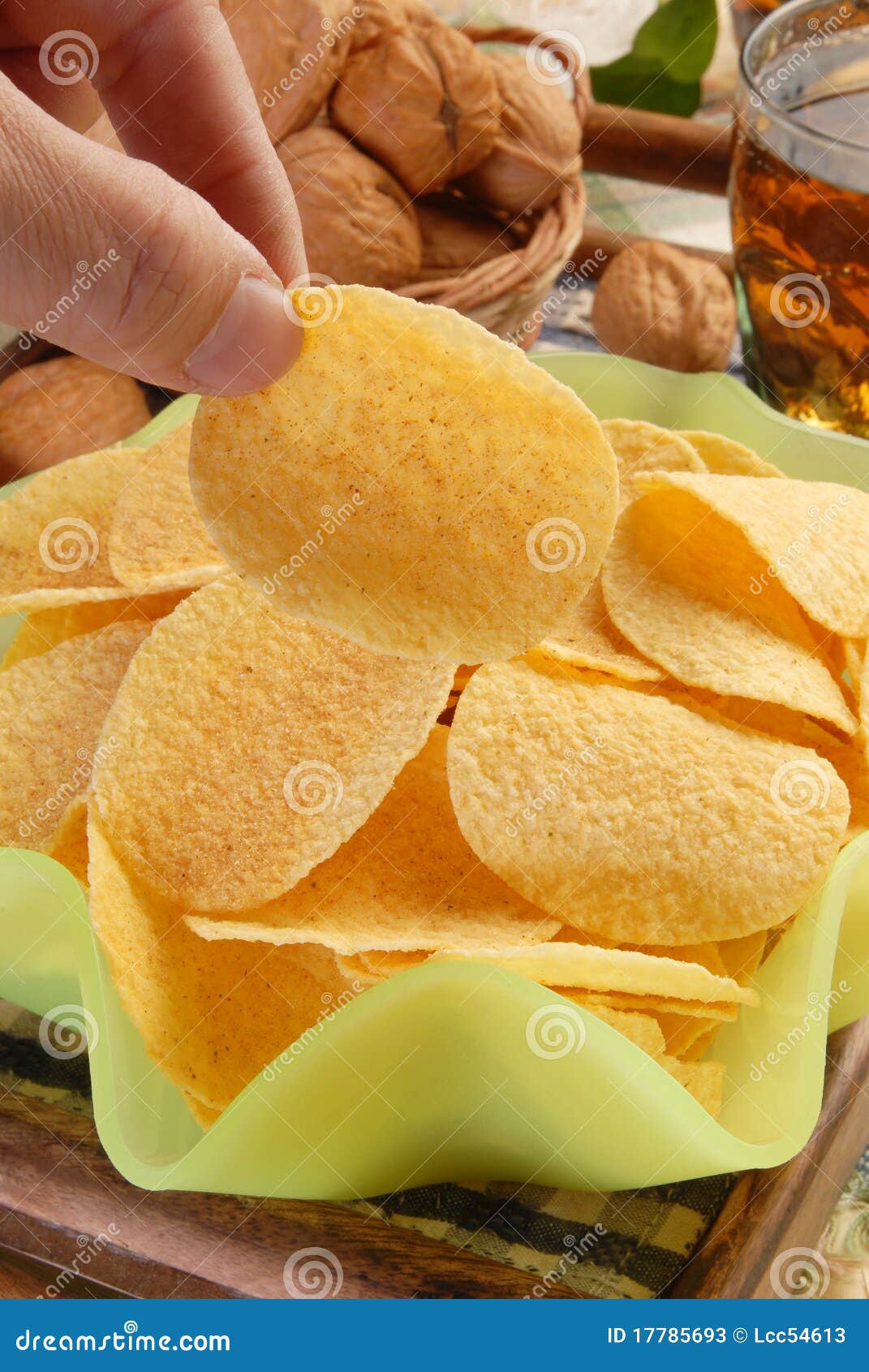 Potato chips stock image. Image of hold, savory, fattening 17785693