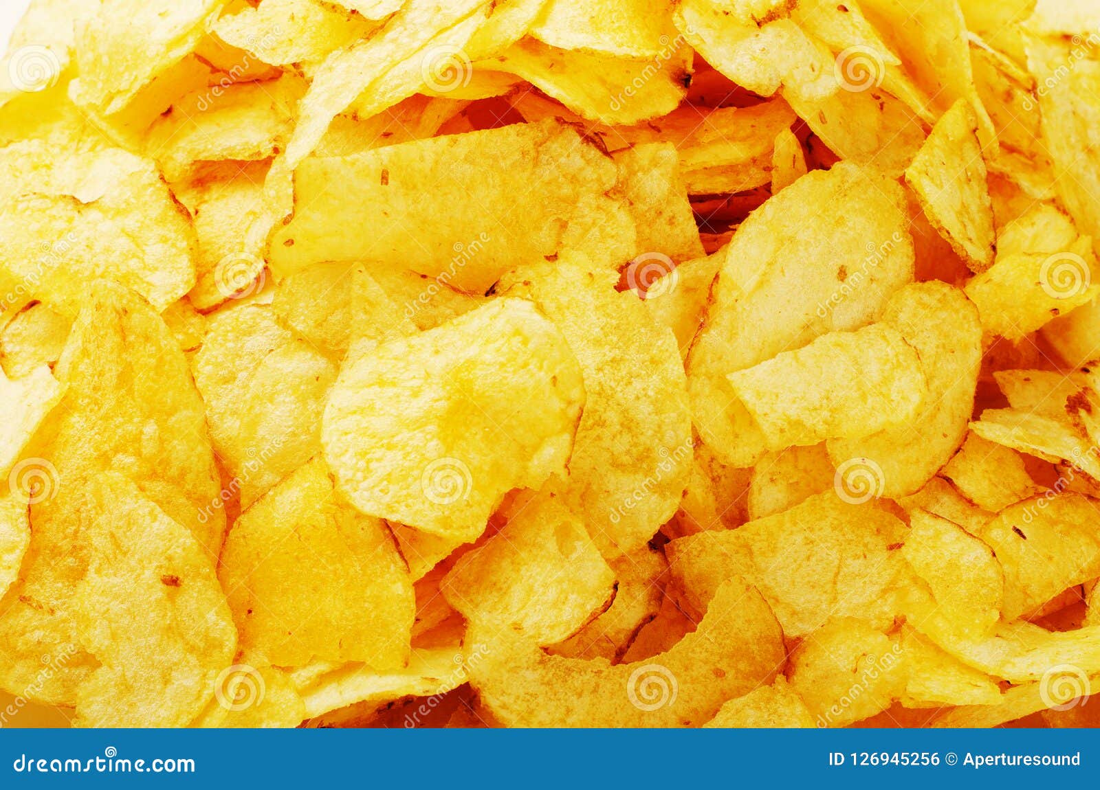 Potato chips background stock photo. Image of slice 126945256