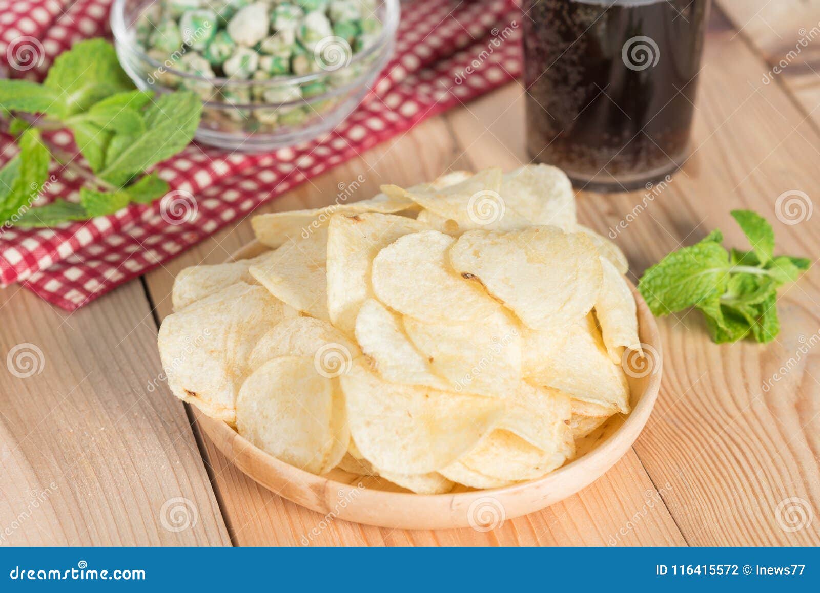 Potato Chips and Green Nuts with Ice Cola. Stock Photo Image of nuts, american 116415572