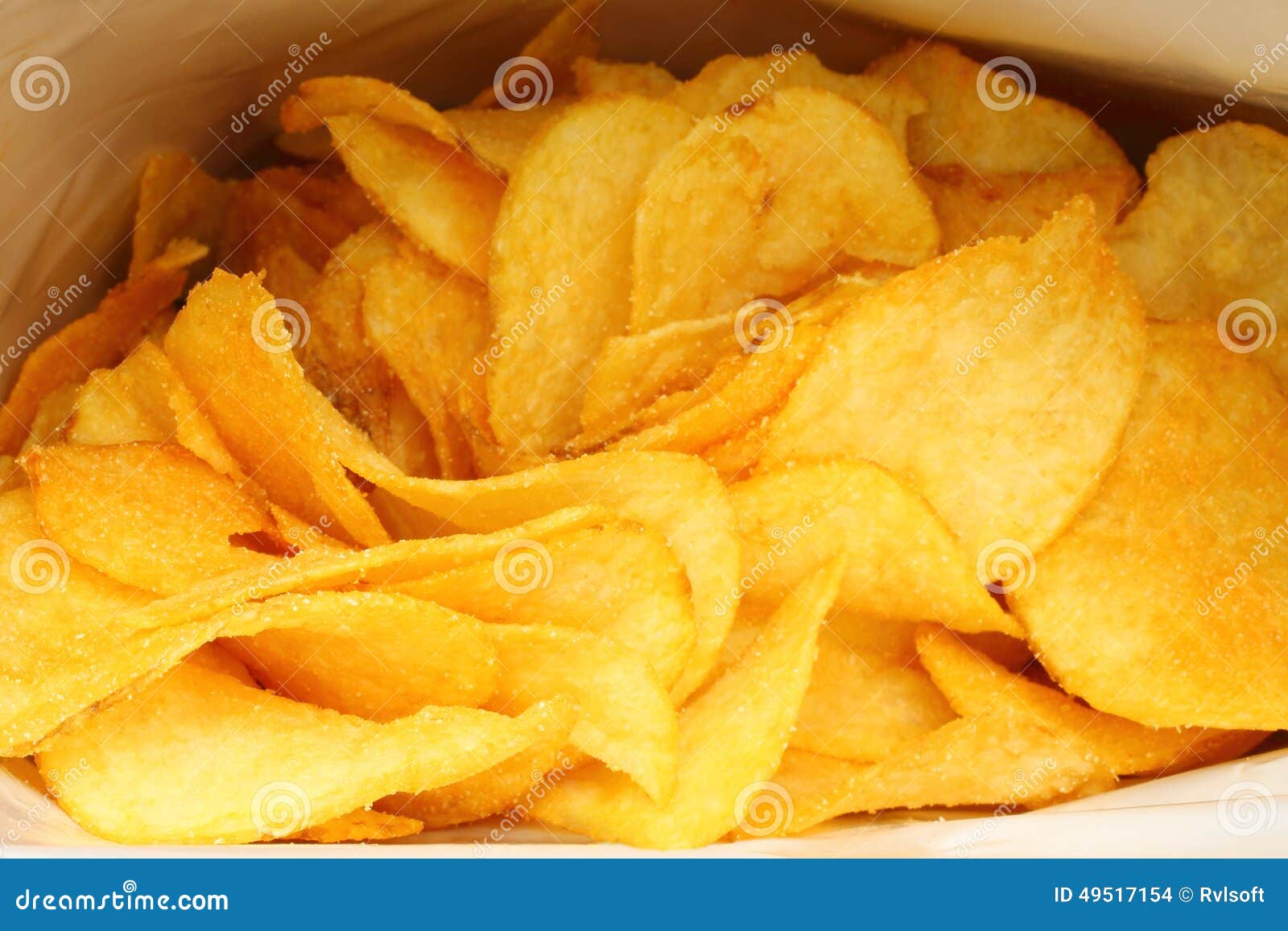 Potato chips in packing stock photo. Image of fattening 49517154