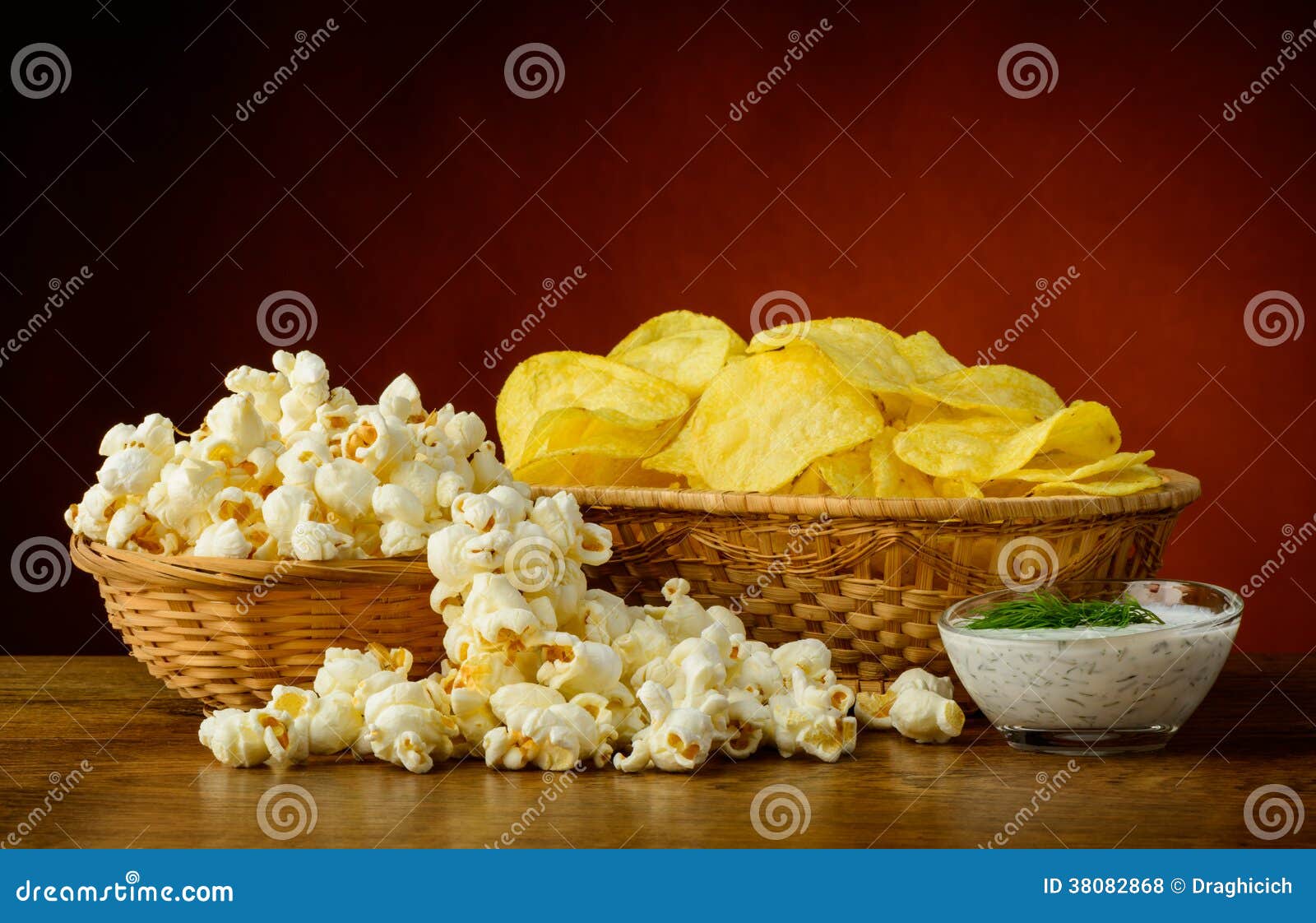 Potato chips and popcorn stock photo. Image of still 38082868