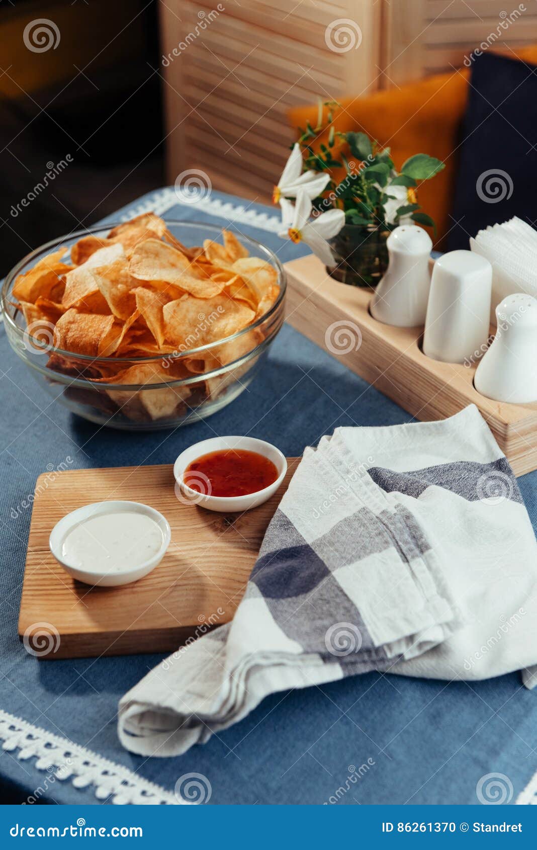 Potato Chips with Sauce on the Table. Homemade Sauces Stock Photo