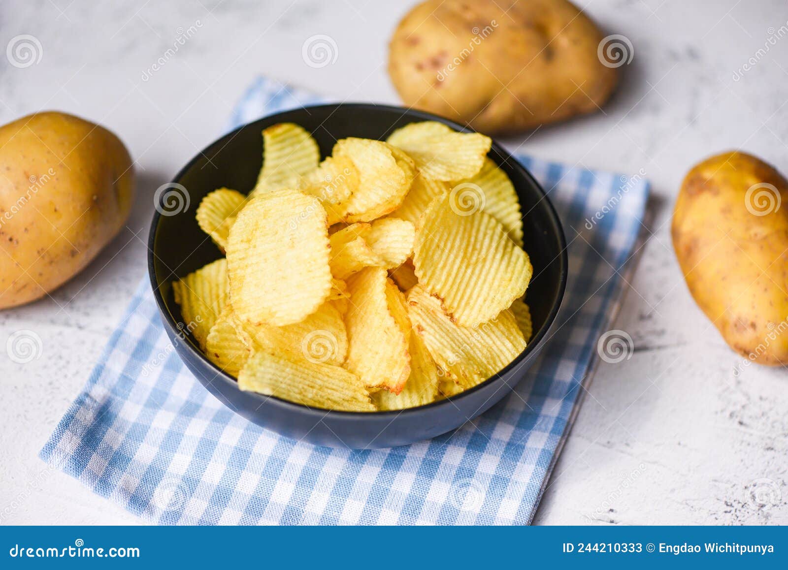 Potato Chips Snack on Bowl, Crispy Potato Chips on the Kitchen Table