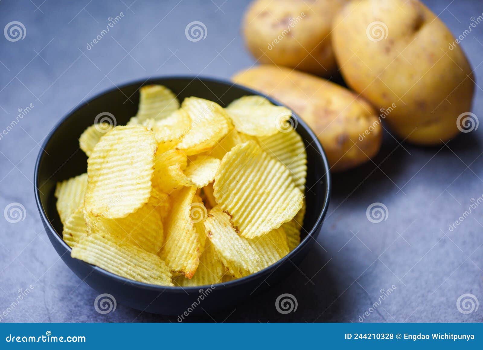 Potato Chips Snack on Bowl, Crispy Potato Chips on the Kitchen Table