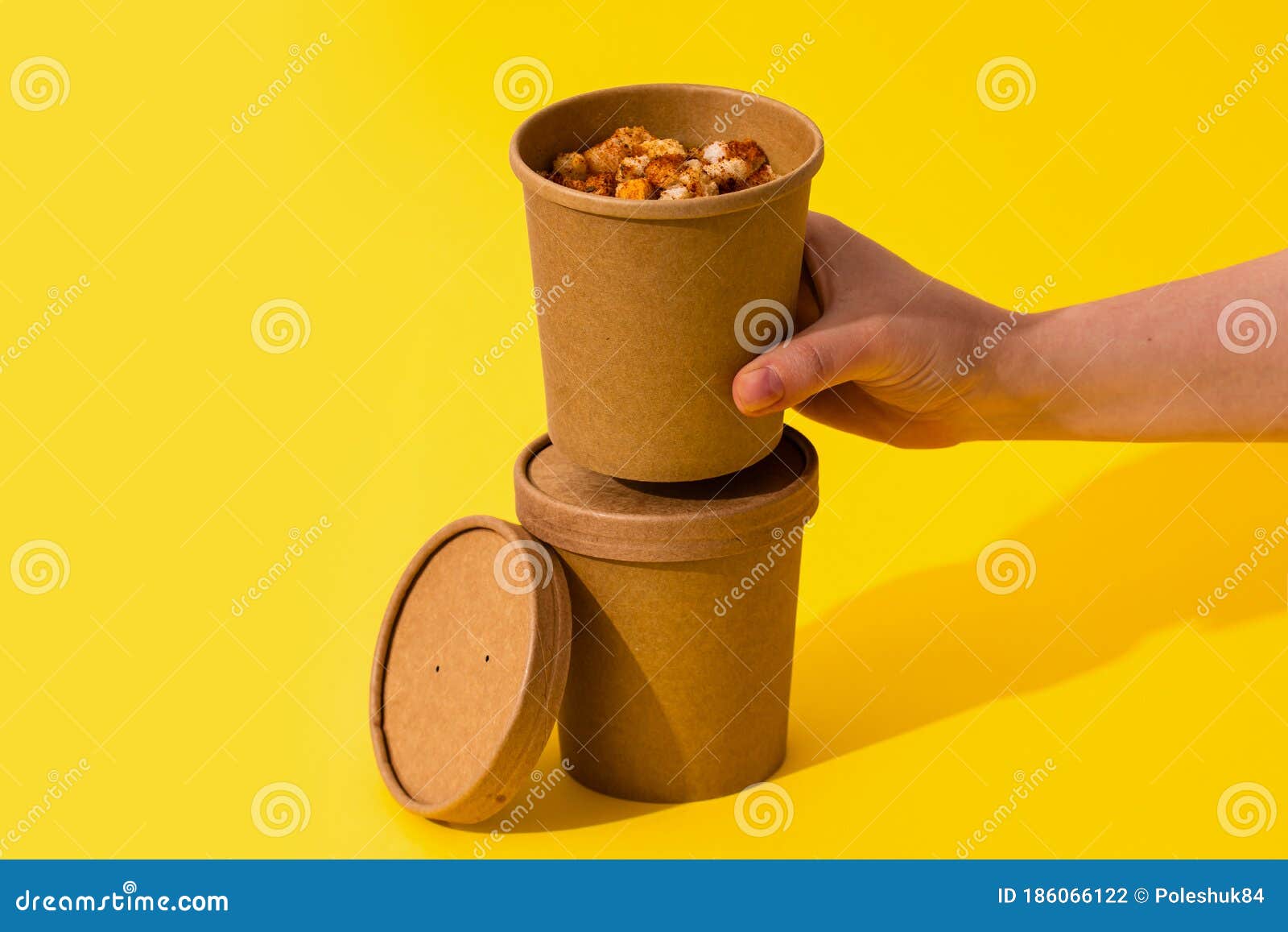 Potato Cream Soup with Croutons in Craft Containers on a Yellow ...