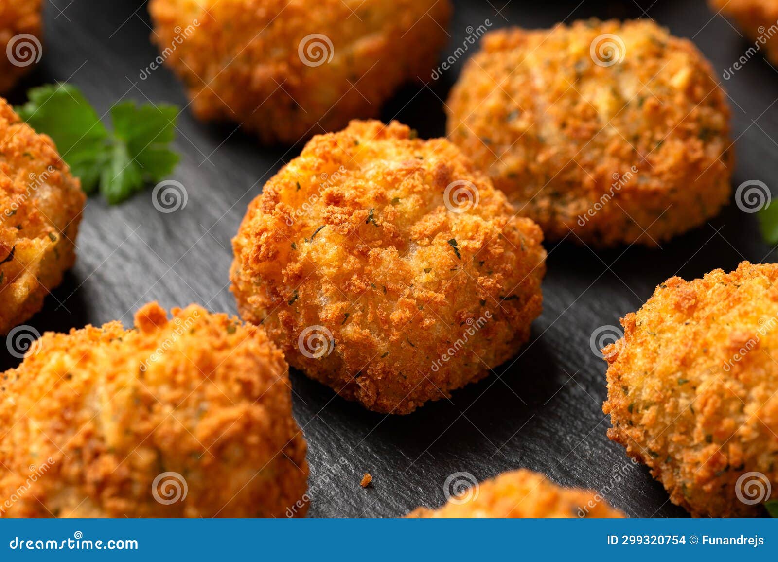 Potato Croquettes with Ham and Cheese on Stone Board Stock Photo