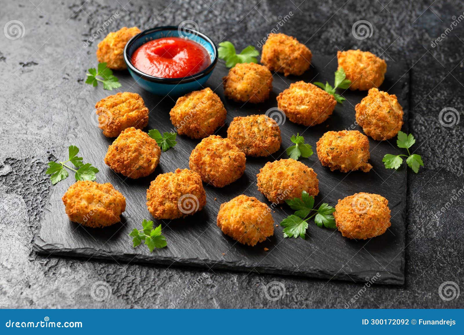 Potato Croquettes with Ham and Cheese on Stone Board Stock Photo