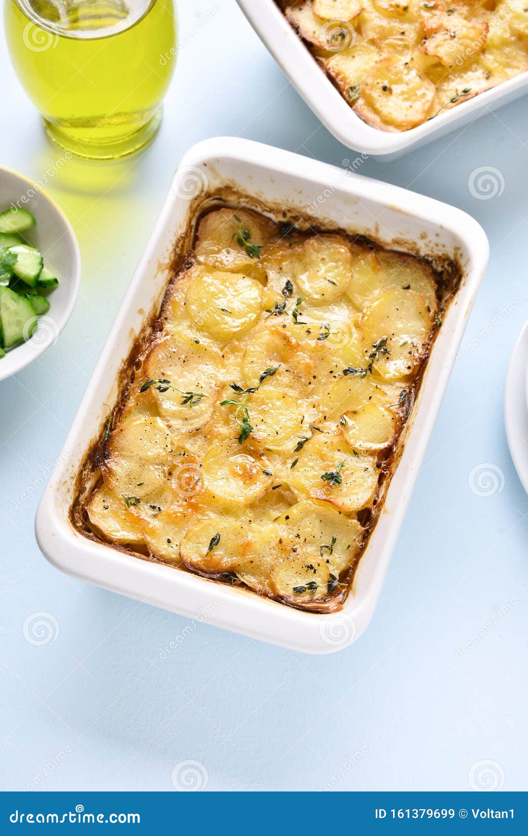 Potato Gratin in Baking Dish Stock Image Image of fresh, blue 161379699
