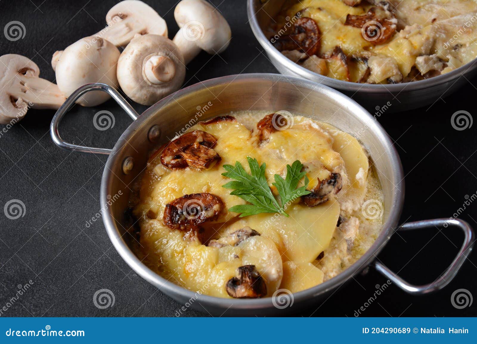 Potato Gratin with Mushrooms in Baking Cocottes Stock Image - Image of ...