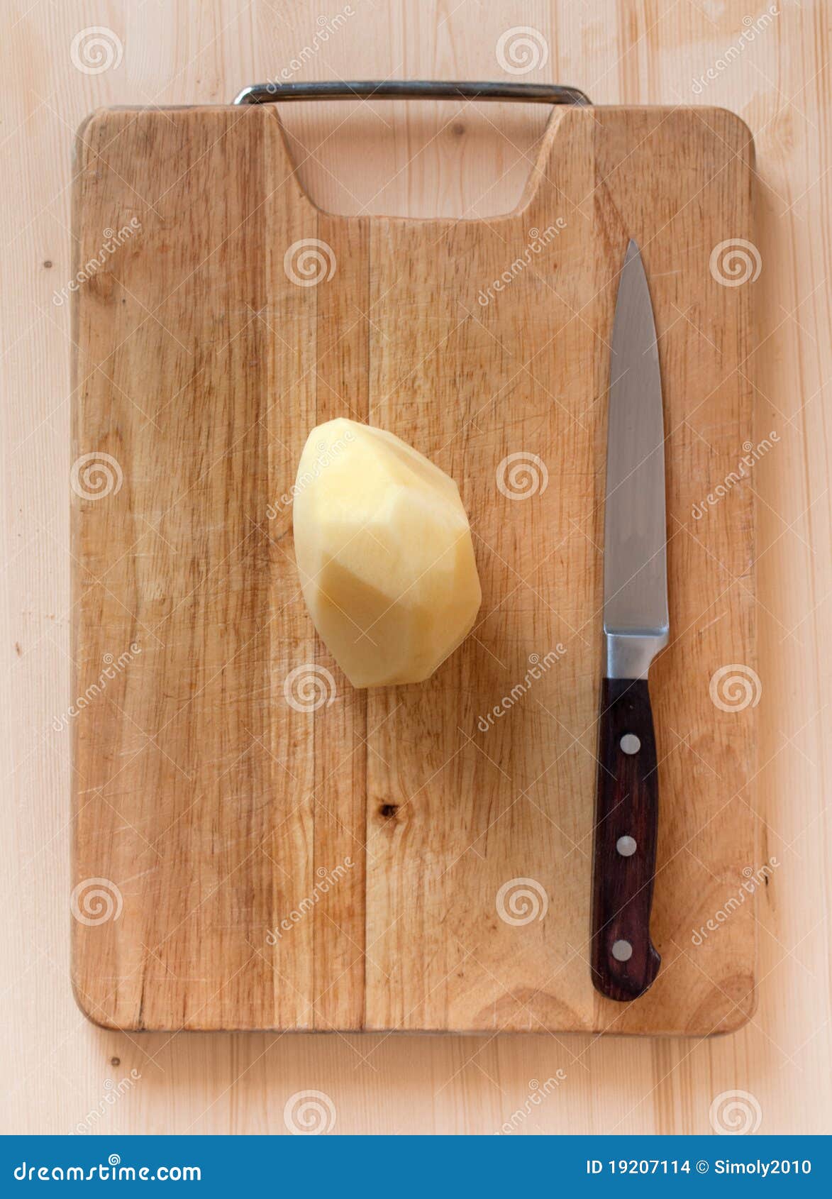 Potato and knife stock photo. Image of potato, food, table 19207114